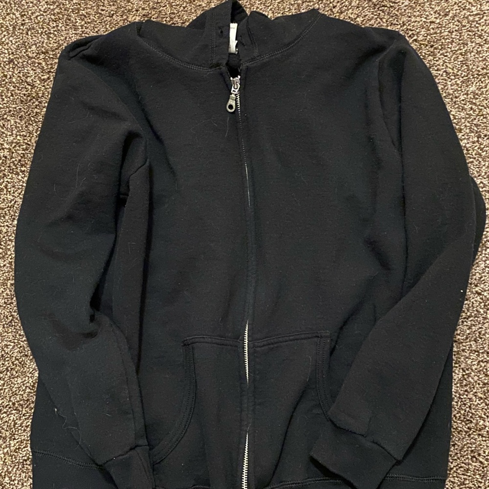 Large black zip up hoodie.